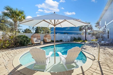 Lounge poolside and soak up the sun in style.