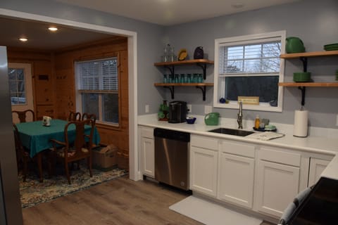 Custom shelves made from 100% salvaged 2" thick lumber, stacked with Fiesta Ware