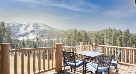 - Scenic balcony dining with mountain views, perfect for morning coffee or evening meals   - Breathtaking ski slopes visible right from the outdoor seating area   - Relax and unwind surrounded by fresh alpine air and endless views