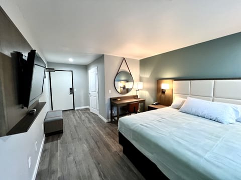 Desk, laptop workspace, free WiFi, bed sheets