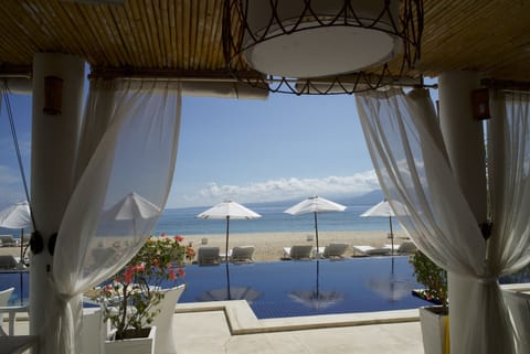 Outdoor pool, open 9:00 AM to 6:00 PM, pool umbrellas, sun loungers