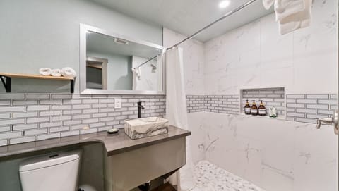 Bathroom with toilet and bath