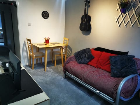 Living room / dining room. Feel free to play guitars!