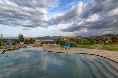 Outdoor pool, pool umbrellas, sun loungers