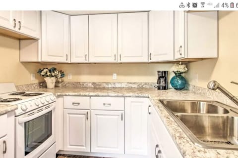 : Modern kitchen with all essentials - Designer Cottage by Wrecked & Refined