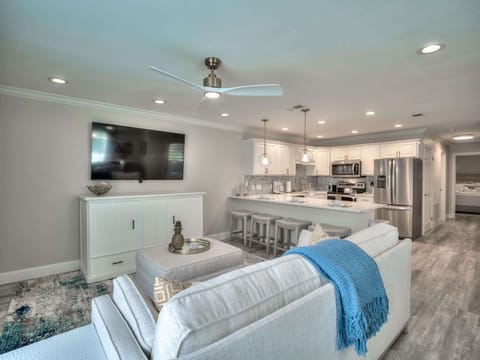 Living room: open concept with plenty of comfortable seating