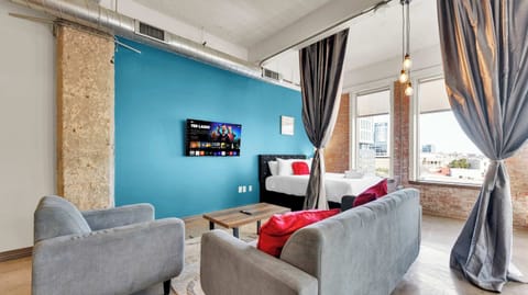 Living Room: Bright and vibrant space with stunning views and chic decor for relaxation or fun!