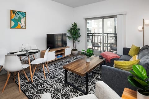Private 4 bedroom, 2 bathroom apartment complete with a full kitchen, Living Area with a couch, dining table, desk, TV in each room, washer/dryer, patio, free parking, Gym, Pool table & much more!