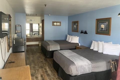 Spacious and bright, featuring plush bedding, warm lighting, and modern furnishings that invite you to unwind