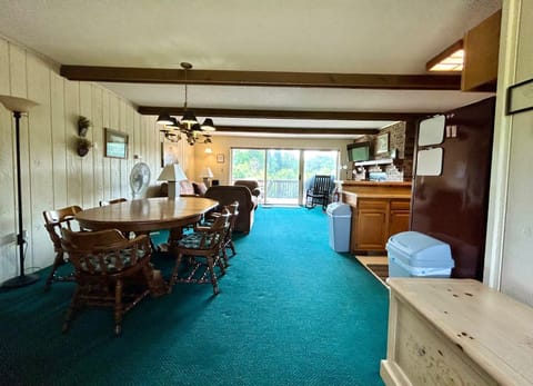 Upstairs has a living room, kitchen, dining room and a full bathroom.