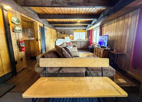 Upon entry to Mountain Top you'll be greeted with a large, comfy sectional couch.