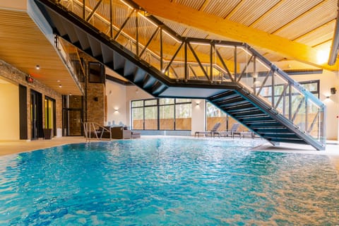 Indoor pool, open noon to 9:00 PM, lifeguards on site