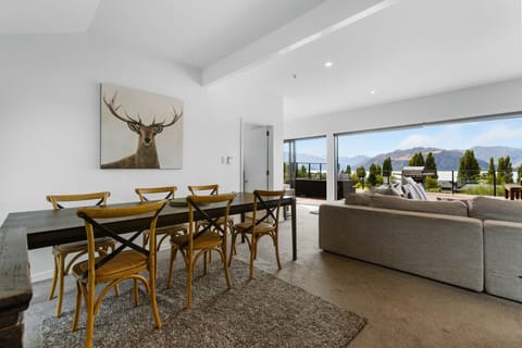 Enjoy a meal at the dining table or relax on the couch and soak in the views