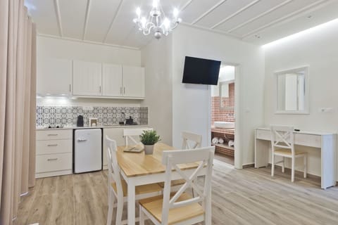 32-inch flat-screen TV with satellite channels