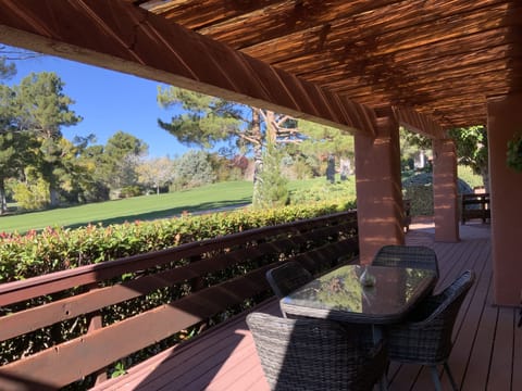 Backyard deck with view of 17th hole at Oak Creek Golf Club