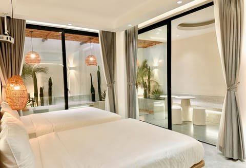 Kin Inspired 3 with Garden | Down comforters, Select Comfort beds, minibar, desk