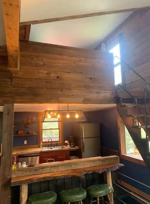 Bar view from living room 1 into kitchen/loft