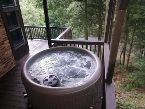 Hot tub overlooking the Clear Fork River