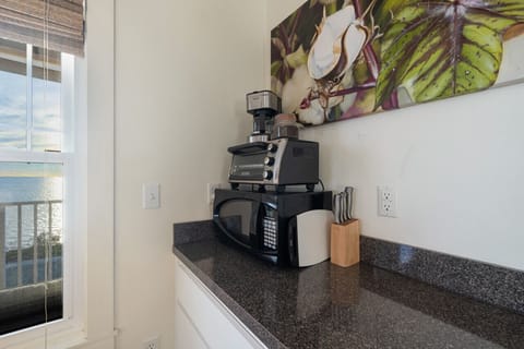 Kitchenette with microwave, toast oven and drip coffee maker