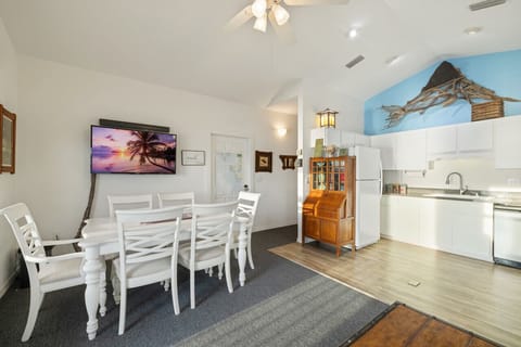 Dining for 6 and a large TV for viewing from the sofa