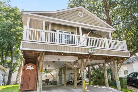 Spacious elevated home with large balcony and shaded parking