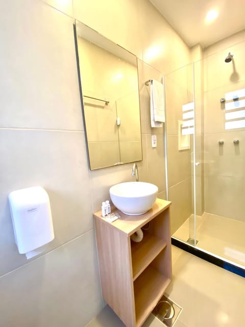 Shower, free toiletries, hair dryer, towels