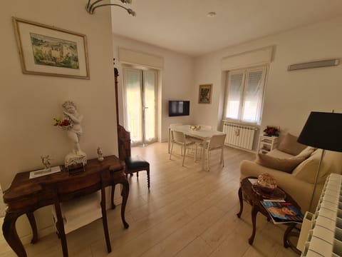 City Apartment | Living area | Flat-screen TV