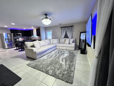 Living Room with 82in Smart tv