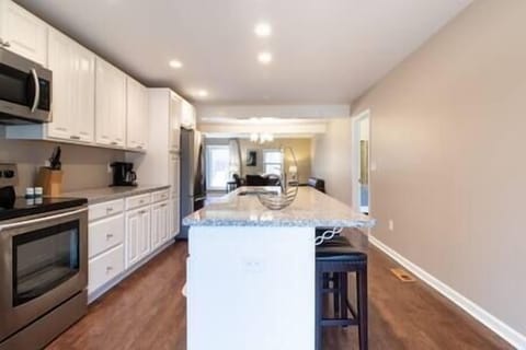 Picture from the kitchen looking at the living room in the back.