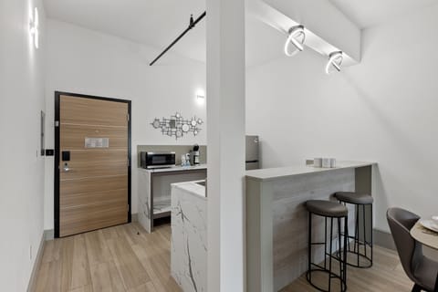 Family Suite, 1 King Bed with Sofa bed, Kitchenette | Private kitchen | Highchair