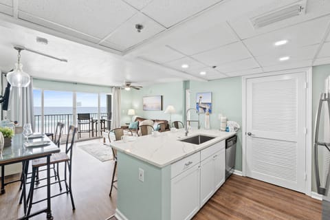 Fully Stocked Kitchen with Bar Seating