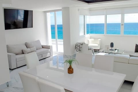 Dinner and living room with ocean view
