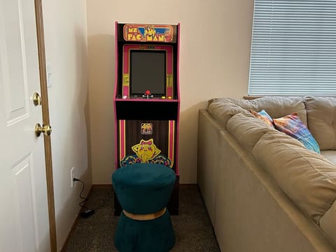 Ms. Pac-Man arcade console with 15 different arcade games