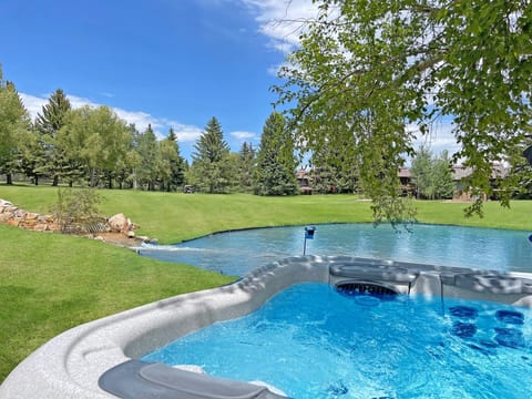 Welcome to Whispering Waters Chalet! The private hot tub is the perfect place to relax where you can hear all the sounds of nature and overlook the pond!