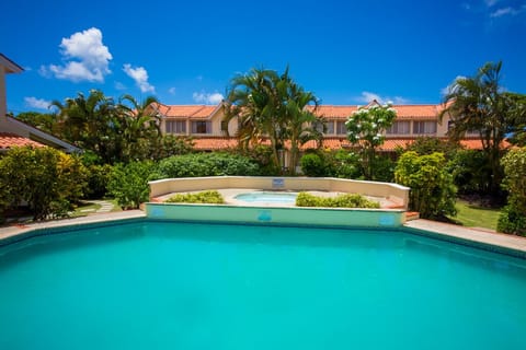 Communal pool and jacuzi - just steps from the property