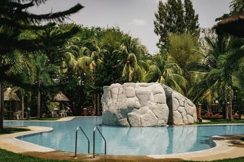 Outdoor pool, open 7:00 AM to 8:00 PM, free cabanas, lifeguards on site