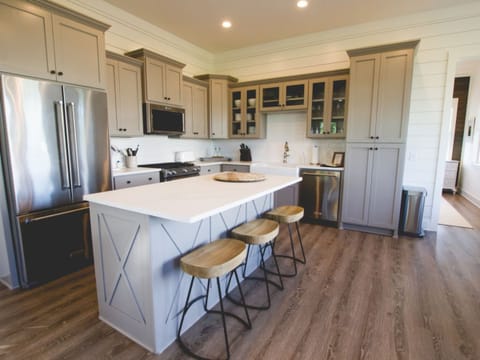 Cottage 1 | Private kitchen | Full-size fridge, microwave, oven, stovetop