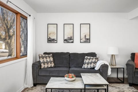 Step into the natural bright and open living space with comfort plush couch. Living room window now feature new privacy blinds for additional comfort and relaxation