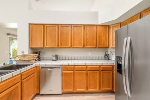 Abundant counter space awaits, providing the perfect canvas for meal preparation in our kitchen. Enjoy the convenience and freedom to cook with ease.
