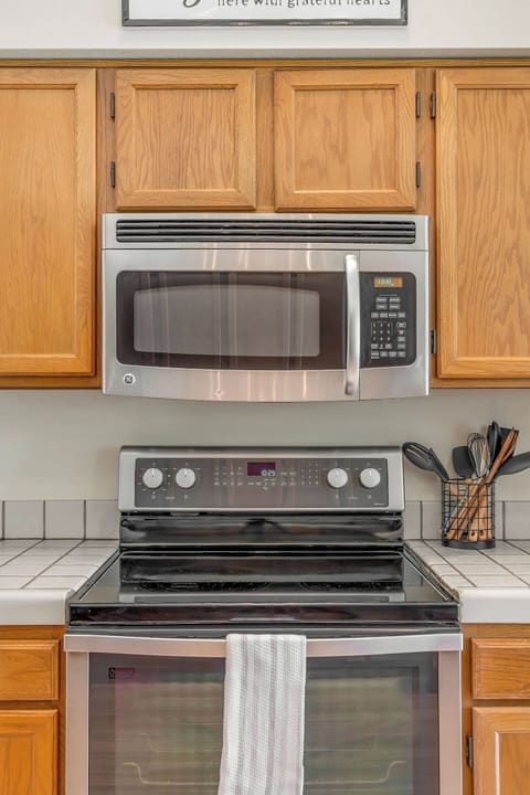 Effortlessly prepare meals with a full-size electric range and microwave in our kitchen. These modern appliances add convenience and versatility to your culinary adventures.