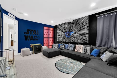 Kids and adults alike will love the Star Wars-themed movie room — endless entertainment!