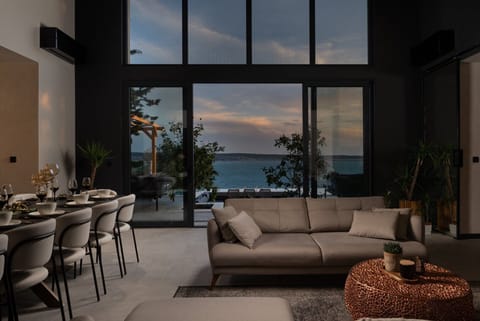Living area with sea view in modern luxury pet friendly villa
