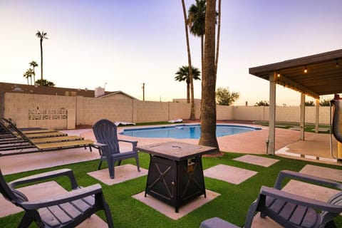Dip into relaxation in a private pool framed by warm, desert-sky hues at sunset.