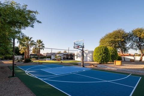 Private half court in the yard for quick pickup games anytime.