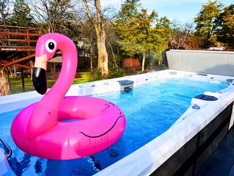 19 ft heated swim spa allows for year around swimming enjoyment for all ages
