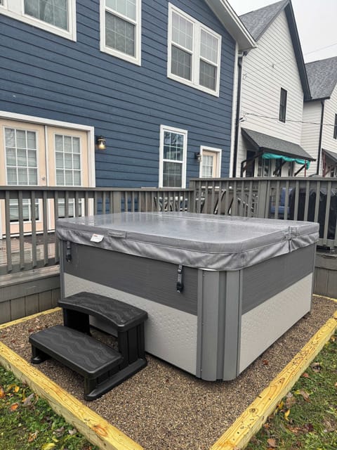 The backyard features a hot tub for your enjoyment! 