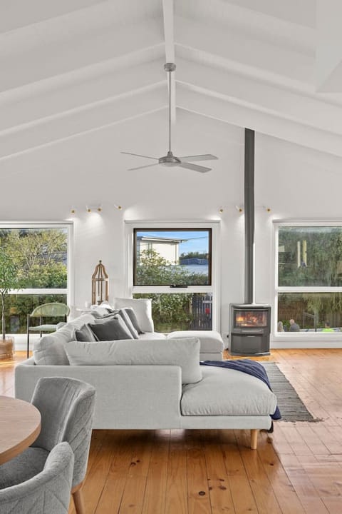 Curl up by the fire after a beach day and watch the sun fade through the windows.