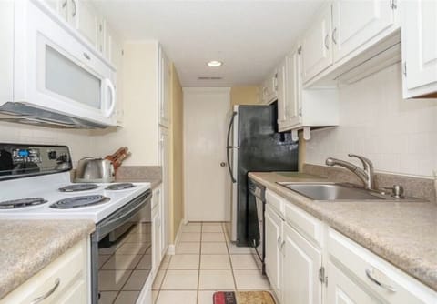 Fully stocked kitchen with all the essentials, perfect for cooking at home during your stay.