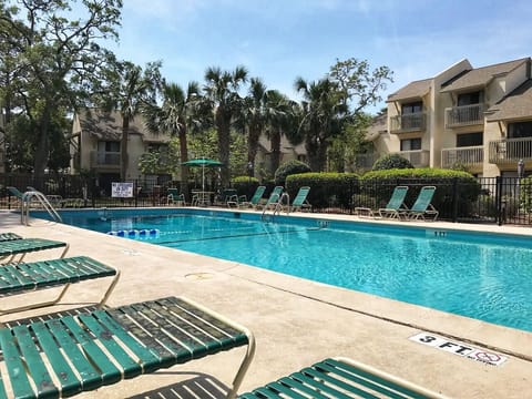 Cool off and unwind at the sparkling community pool, just steps from the villa! Whether you`re soaking up the sun on a lounge chair or taking a refreshing dip, this peaceful oasis is the perfect spot to relax after a day at the beach.