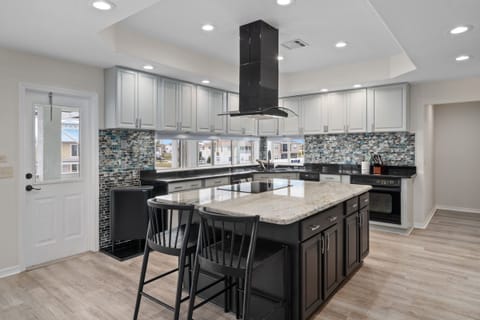 Grab a seat for a quick bite at the large kitchen island